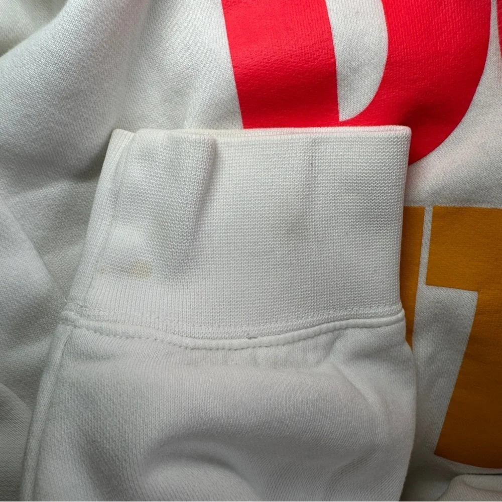 White Sweatshirt with Bold Slogan